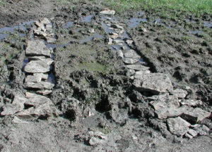 Rocks making a stone pathway for tires