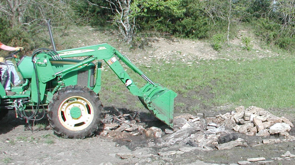 Dumping rocks in drainage area