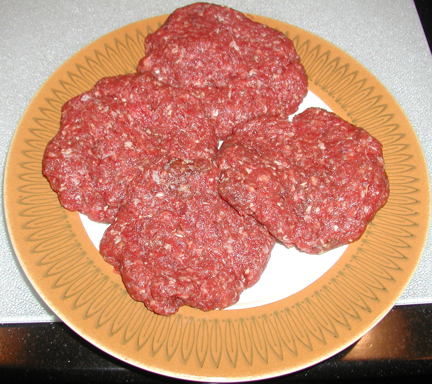 Bison burgers before cooking